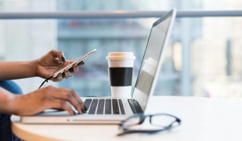 Free laptop on table top stock photo