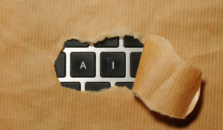 A piece of cardboard with a keyboard appearing through it